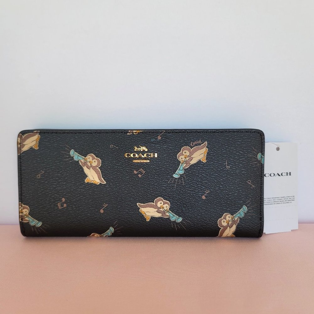 COACH Slim Bifold in Coated Canvas with Musical Penguin Print-⭐FINAL PRICE $98🎈